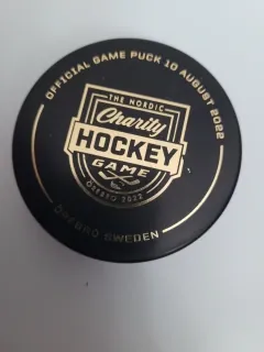 Hokejový puky - dvoustranný - Official Game pUck 2022 Charity Hockey Game